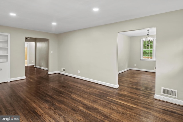 12904 Two Farm Dr, Silver Spring, MD 20904 - unfurnished room with wood finished floors, baseboards, recessed lighting, and a chandelier