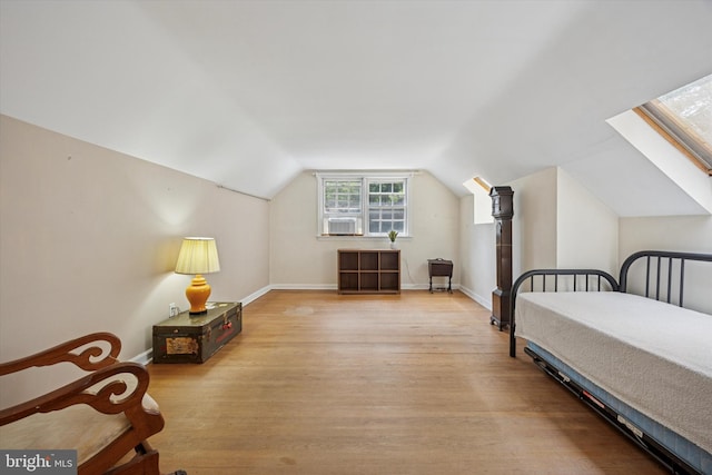 343 Michigan Ave, Swarthmore, PA 19081 - bedroom with wood finished floors, vaulted ceiling, and cooling unit