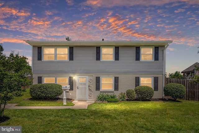 view of front of property featuring brick siding