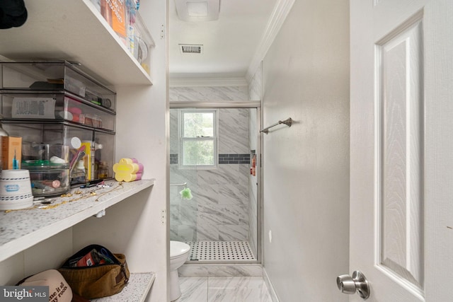 full bath featuring marble look tiles, toilet, crown molding, a shower stall, and baseboards