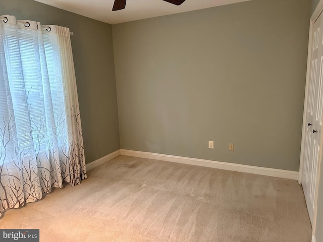 1341 Thornwood Dr, Mount Laurel, NJ 08054 - spare room with light carpet, ceiling fan, and baseboards