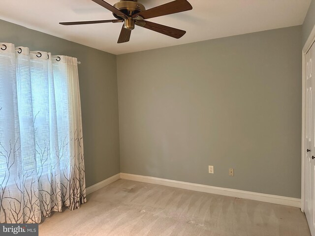 1341 Thornwood Dr, Mount Laurel, NJ 08054 - spare room with light colored carpet, a ceiling fan, baseboards, and plenty of natural light