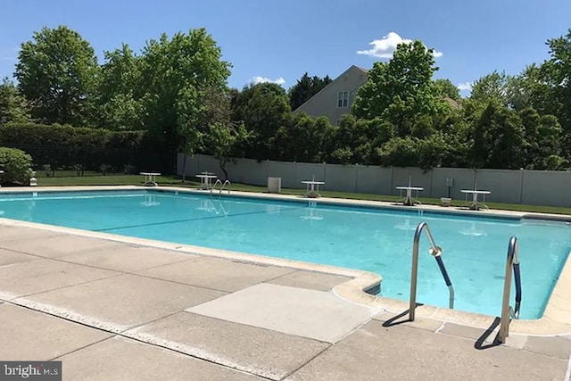 1341 Thornwood Dr, Mount Laurel, NJ 08054 - community pool featuring a patio and view of wooded area
