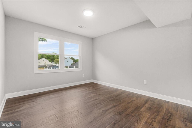 6121 Ducketts Ln, Elkridge, MD 21075 - unfurnished room with dark wood-style flooring and baseboards