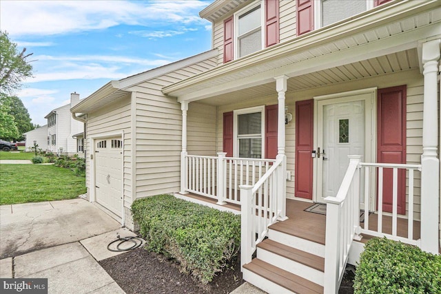 6121 Ducketts Ln, Elkridge, MD 21075 - entrance to property featuring covered porch and a garage
