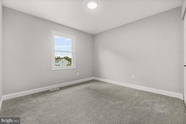 6121 Ducketts Ln, Elkridge, MD 21075 - empty room featuring baseboards and carpet floors