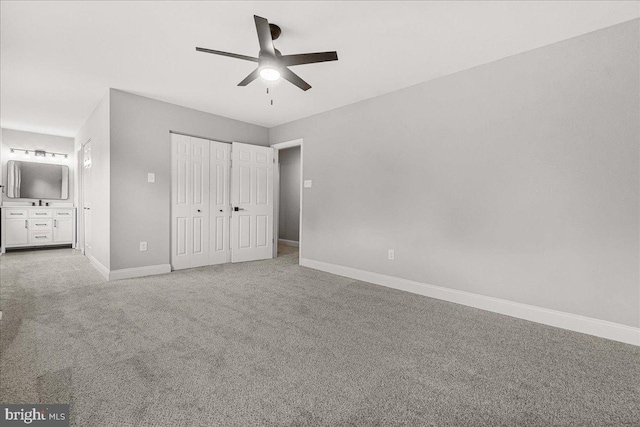 6121 Ducketts Ln, Elkridge, MD 21075 - unfurnished bedroom featuring baseboards, carpet floors, connected bathroom, and a closet