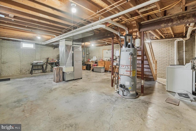 6121 Ducketts Ln, Elkridge, MD 21075 - below grade area with water heater, washer / clothes dryer, heating unit, and stairs