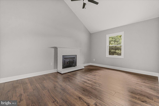 6121 Ducketts Ln, Elkridge, MD 21075 - unfurnished living room with a fireplace, ceiling fan, lofted ceiling, dark wood-type flooring, and baseboards