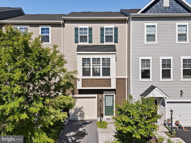 105 Poinsettia Way, Stephenson, VA 22656 - townhome / multi-family property with driveway and a garage