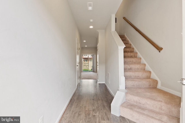105 Poinsettia Way, Stephenson, VA 22656 - stairway with baseboards, recessed lighting, and wood finished floors