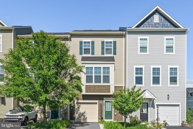 105 Poinsettia Way, Stephenson, VA 22656 - view of property featuring an attached garage and driveway