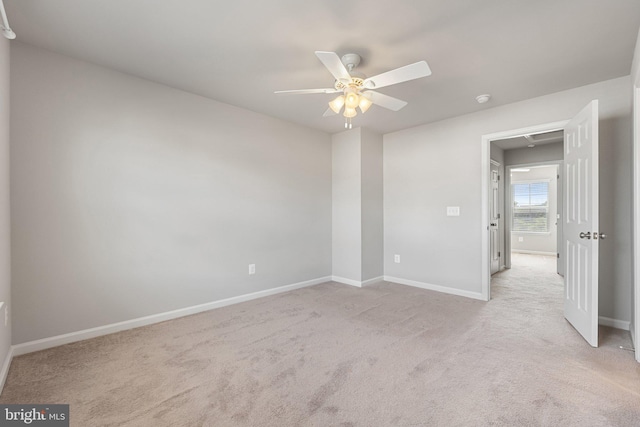 105 Poinsettia Way, Stephenson, VA 22656 - spare room featuring ceiling fan, light carpet, and baseboards