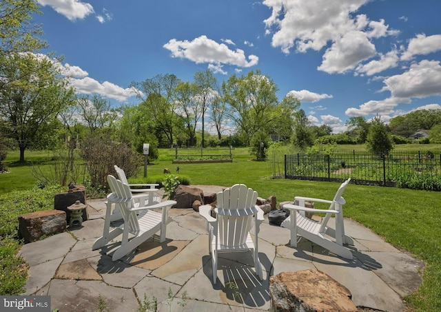 view of patio / terrace with an outdoor fire pit