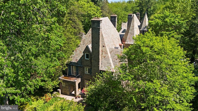 view of subject property featuring a forest