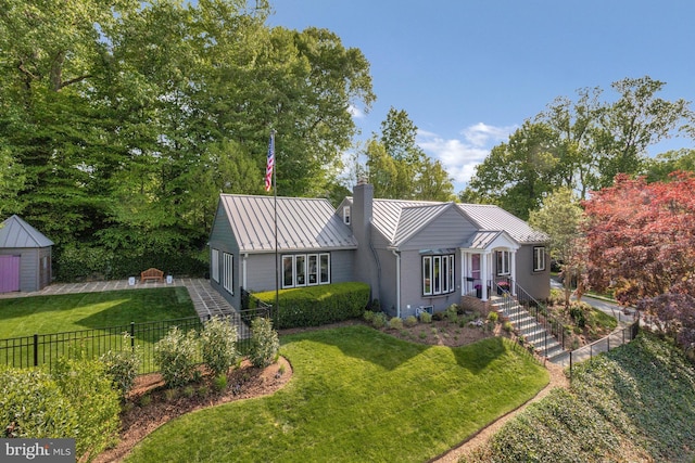 5018 36th St N, Arlington, VA 22207 - single story home with a standing seam roof, metal roof, a chimney, and view of scattered trees