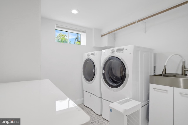 5018 36th St N, Arlington, VA 22207 - laundry area with washing machine and clothes dryer and recessed lighting