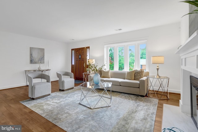 5018 36th St N, Arlington, VA 22207 - living room with a fireplace with flush hearth, wood finished floors, and baseboards