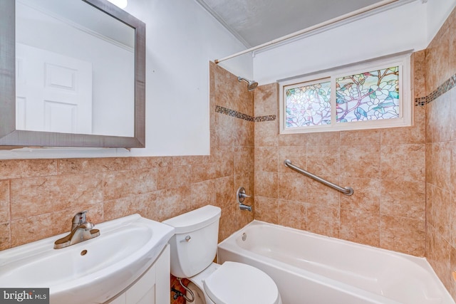 107 Juniper Dr, Levittown, PA 19056 - full bath with toilet, tile walls, vanity, and bathtub / shower combination