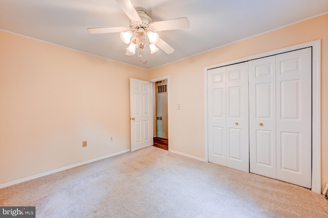 107 Juniper Dr, Levittown, PA 19056 - unfurnished bedroom featuring baseboards, a closet, a ceiling fan, and carpet