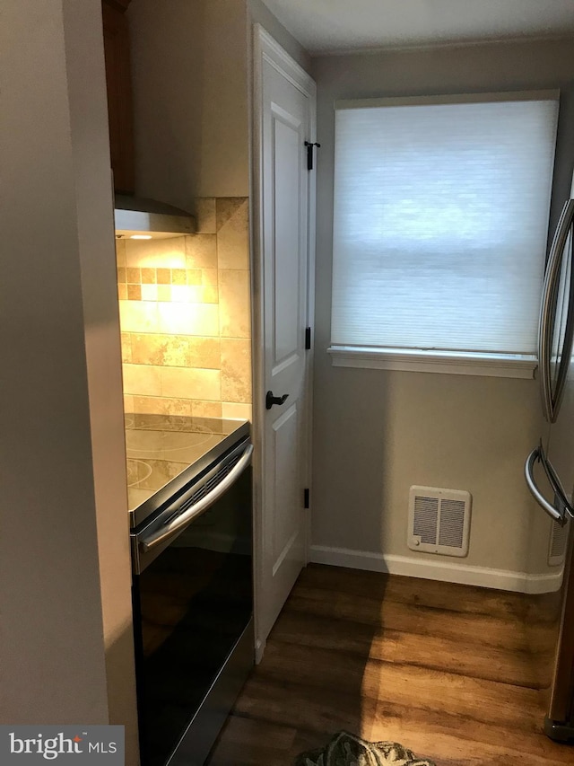 214 Leeward Ave, Beach Haven, NJ 08008 - doorway with visible vents, baseboards, and dark wood-style floors