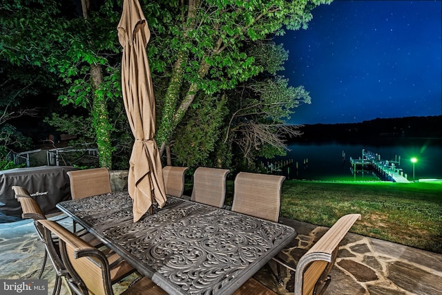 2031 Indian Cir, Saint Leonard, MD 20685 - patio at twilight with a lawn and outdoor dining space
