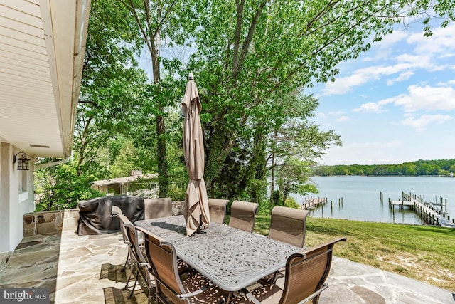 2031 Indian Cir, Saint Leonard, MD 20685 - view of patio / terrace featuring a boat dock, a water view, and outdoor dining space