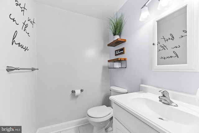2031 Indian Cir, Saint Leonard, MD 20685 - bathroom featuring vanity, toilet, and baseboards