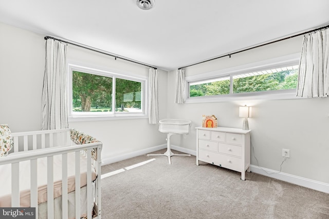 2031 Indian Cir, Saint Leonard, MD 20685 - bedroom featuring a nursery area, light carpet, baseboards, and visible vents