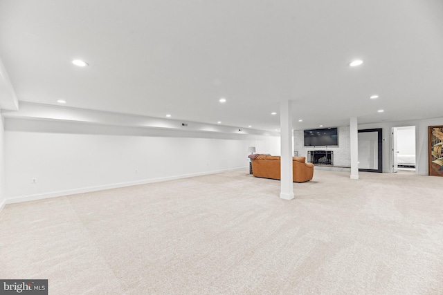 2031 Indian Cir, Saint Leonard, MD 20685 - finished basement with a fireplace, carpet floors, baseboards, and recessed lighting