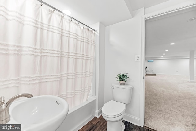 2031 Indian Cir, Saint Leonard, MD 20685 - bathroom with a sink, toilet, baseboards, and recessed lighting