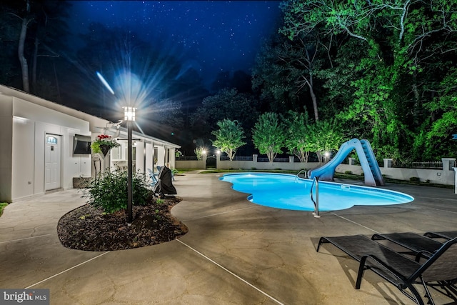 2031 Indian Cir, Saint Leonard, MD 20685 - view of swimming pool featuring a fenced backyard, a patio, a fenced in pool, and a water slide
