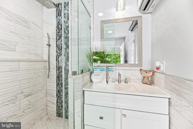2031 Indian Cir, Saint Leonard, MD 20685 - full bathroom with a stall shower, tile walls, vanity, and an AC wall unit