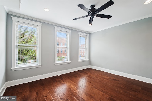 spare room featuring ornamental molding, baseboards, dark wood-style flooring, recessed lighting, and ceiling fan