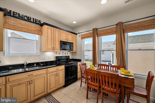 22 Flounder Ln, Ocean City, MD 21842 - kitchen with a sink, dark countertops, black appliances, light tile patterned flooring, and recessed lighting