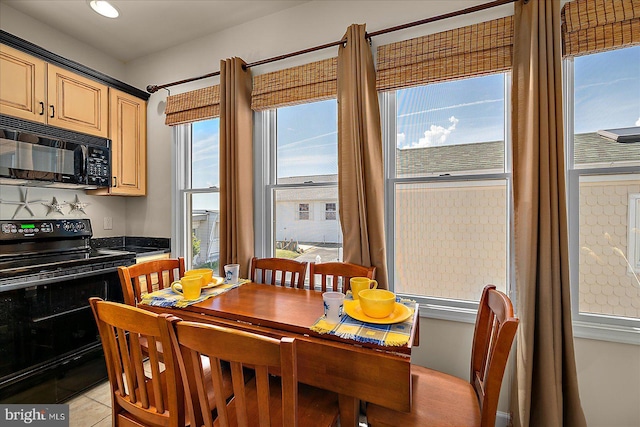 22 Flounder Ln, Ocean City, MD 21842 - dining area with light tile patterned floors