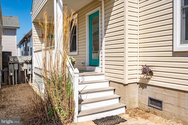 22 Flounder Ln, Ocean City, MD 21842 - doorway to property with fence and visible vents
