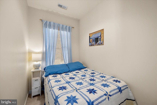 22 Flounder Ln, Ocean City, MD 21842 - bedroom with baseboards, visible vents, and tile patterned floors