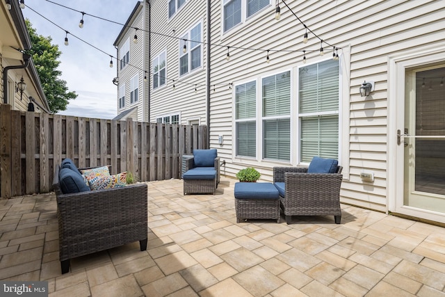 9204 Alvyn Lake Cir, Bristow, VA 20136 - view of patio / terrace featuring fence