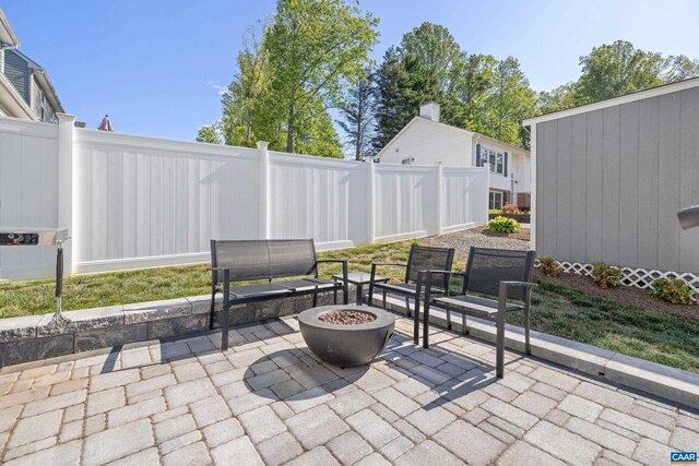 4286 Sunset Dr, Charlottesville, VA 22911 - view of patio featuring a fire pit and fence