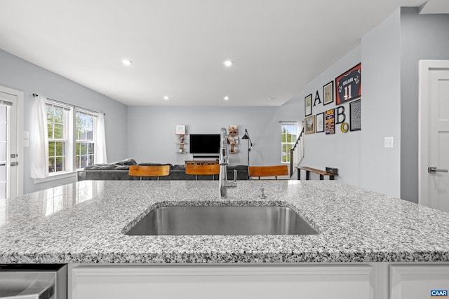 4286 Sunset Dr, Charlottesville, VA 22911 - kitchen with a sink, open floor plan, plenty of natural light, light stone counters, and recessed lighting