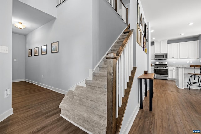 4286 Sunset Dr, Charlottesville, VA 22911 - stairs featuring wood finished floors, baseboards, and recessed lighting