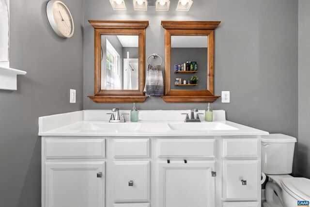 4286 Sunset Dr, Charlottesville, VA 22911 - bathroom with double vanity and toilet
