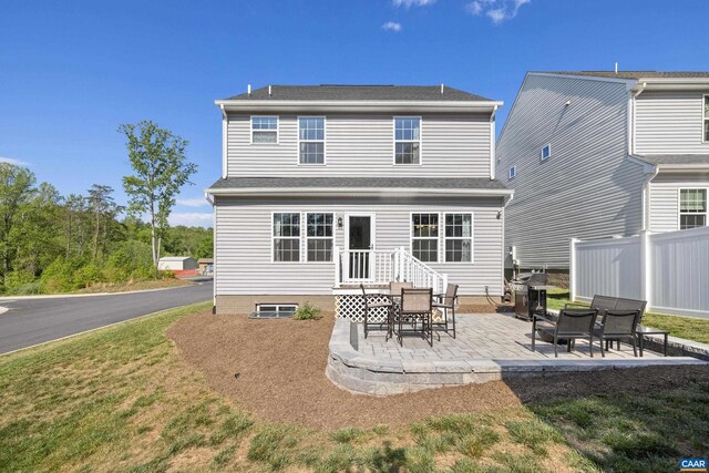 4286 Sunset Dr, Charlottesville, VA 22911 - back of property with a patio area and a lawn
