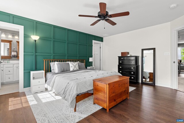 4286 Sunset Dr, Charlottesville, VA 22911 - bedroom with a decorative wall, wood finished floors, ceiling fan, and ensuite bathroom