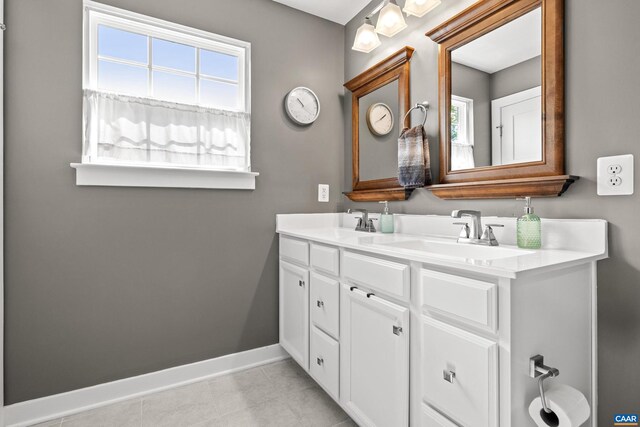 4286 Sunset Dr, Charlottesville, VA 22911 - bathroom featuring baseboards, double vanity, and tile patterned floors