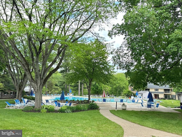 371 Old Forge Xing Unit 371, Devon, PA 19333 - surrounding community featuring a pool and a patio