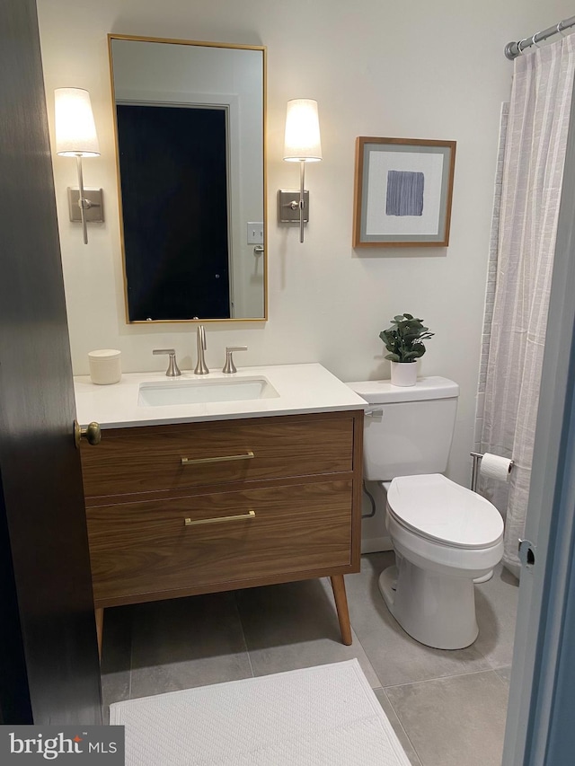 371 Old Forge Xing Unit 371, Devon, PA 19333 - bathroom featuring tile patterned flooring, vanity, toilet, and a shower with curtain
