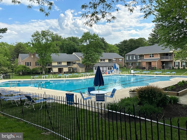 371 Old Forge Xing Unit 371, Devon, PA 19333 - community pool with a patio, a residential view, and view of scattered trees