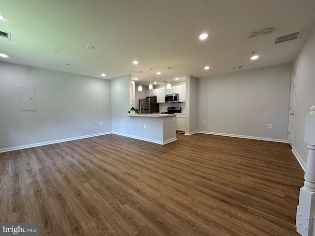 43577 Patching Pond Sq, Ashburn, VA 20147 - unfurnished living room with dark wood finished floors, recessed lighting, baseboards, and electric panel